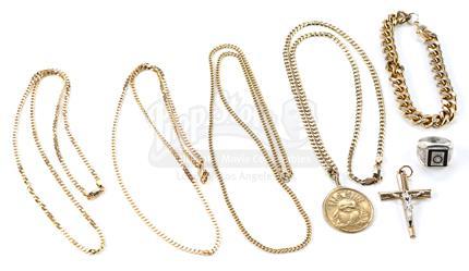 Richie DiMaso’s (Bradley Cooper) Gold Jewelry