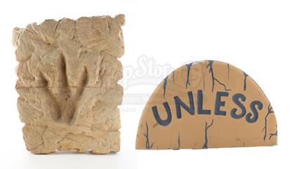 IN SEARCH OF DR. SEUSS (1994) - Dr. Seuss Office Carved Foam Dinosaur Footprint Relief and ‘Unless’ Stone